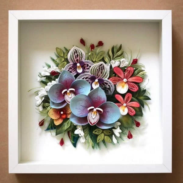 quilled and paper sculpture multicolor floral arrangement in square white shadowbox frame