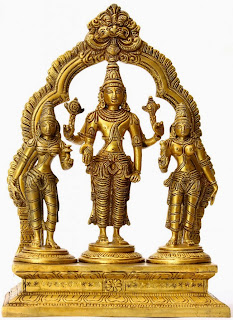 Vishnu, the benevolent lord, flanked by Shreedevi, goddess of heavenly fortune and Bhoodevi, goddess of earthly wealth; South Indian bronze idols 