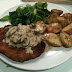 Breaded pork escalope with roasted new potatoes and chestnut mushroom sauce