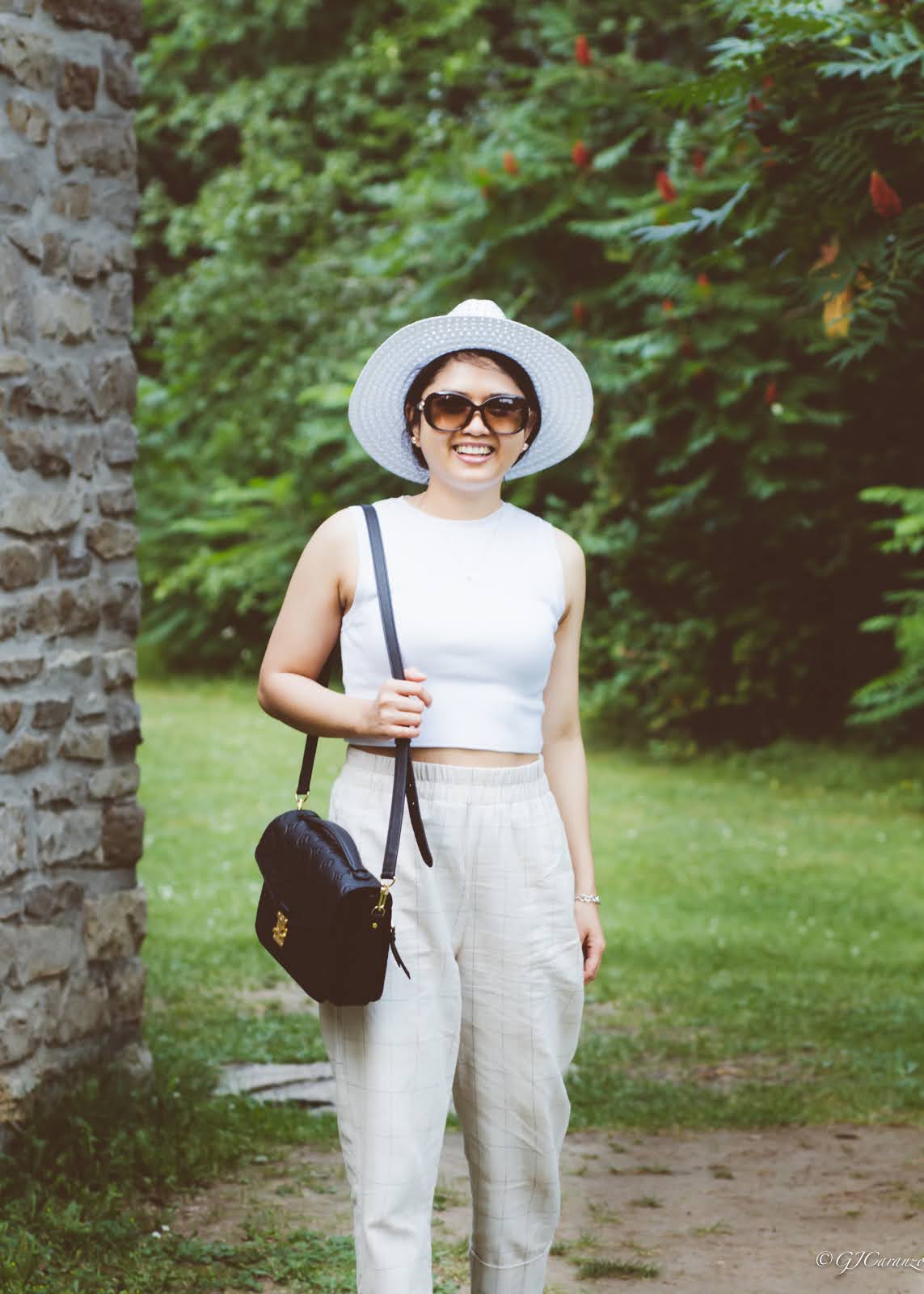 zara knit crop top_zara cuffed pants_louis vuitton pochette metis in black empreinte leather_coach bleeker sandals_gucci sunglasses_walmart sun hat