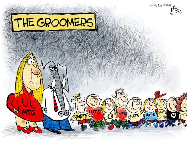 Title:  The Groomers.  Image:  Marjorie Taylor Green and Republican Elephant surrounded by children wearing tee shirts that read 