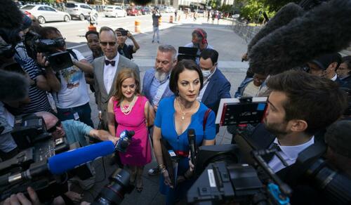 Sarah Ransome, an alleged victim of Jeffrey Epstein and Ghislaine Maxwell, right, alongside Elizabeth Stein, left, speak to members of the media outside federal court in New York, on June 28, 2022.