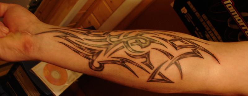 Tribal tattoo on forearm