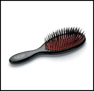 Escova de cabelo oval