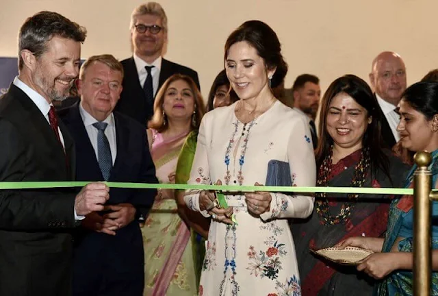 Crown Princess Mary wore a Jerry floral print silk dress by Vilshenko. Raj Ghat monument Mahatma Gandhi