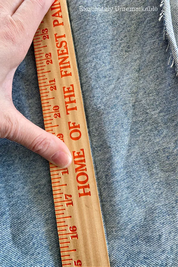 Drawing A Pencil Line To Cut Jeans