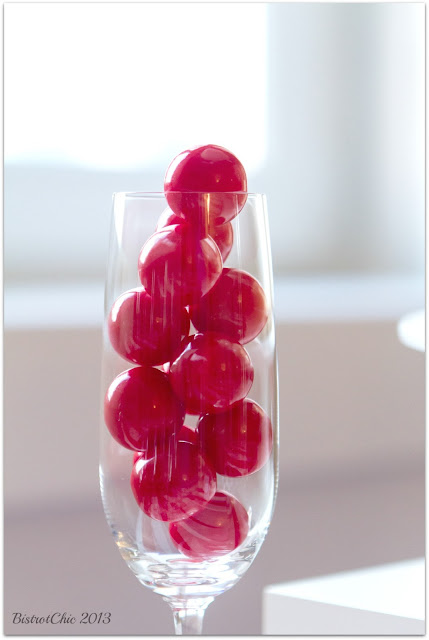 Gumballs in a glass of champagne party decoration idea from BistrotChic