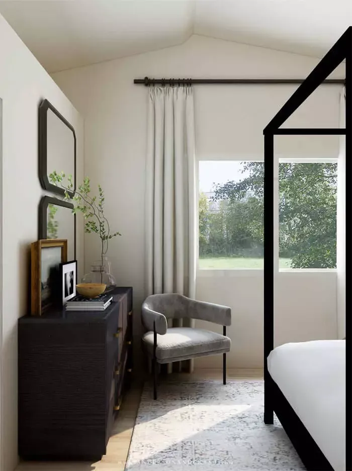 Dresser and chair at foot of bed