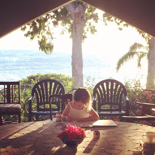 Bella doing homework in Jamaica