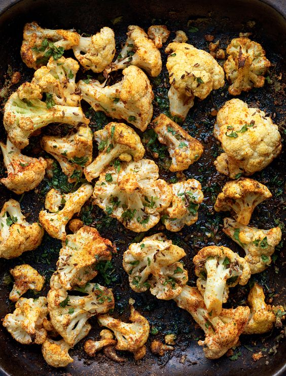 Make the most of the humble cauliflower with Madhur Jaffrey's simple recipe Roasted Cauliflower with Punjabi Seasonings. This dish makes for an excellent midweek meal served alongside pickles and rice.