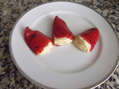 Piquillo peppers stuffed with potato omelette cream