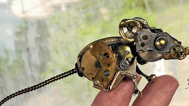 Intricate steampunk sculpture of recycled old parts watch