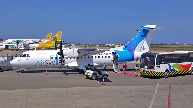 Air Swift ATR aircraft with red carpet on the tarmac at Mactan Airport