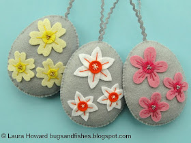 Wool felt Easter eggs decorated with spring flowers