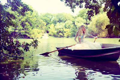 woman in rowboat central park, top fashion photographers los angeles, 