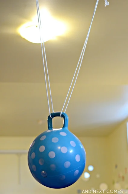 DIY ball swing hanging up in a basement