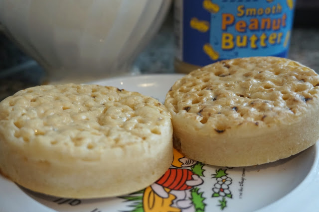 two crumpets with peanut butter