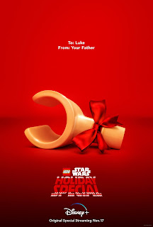 Lego hand tied with a bow - message reads To: Luke, From: Your Father