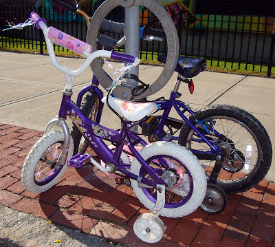 children's bikes locked in front of school