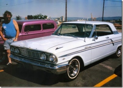 31 1964 Ford Fairlane Hardtop Coupe in the Rainier Shopping Center parking lot for Rainier Days in the Park on July 13, 1996