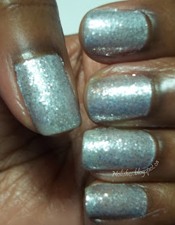 Mani swatch of Nicole by OPI nail polish - silver glitter in a milky white translucent base