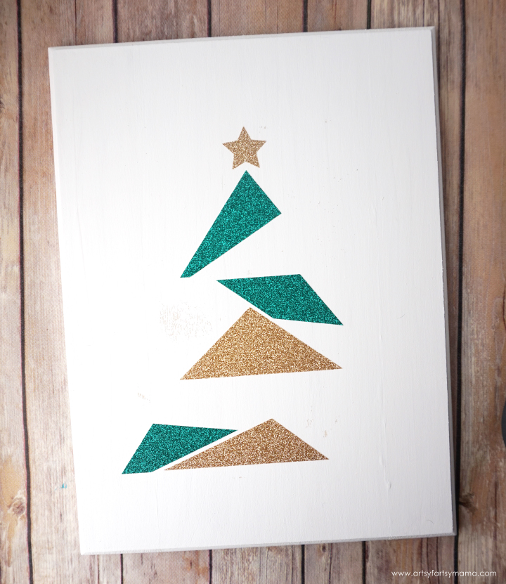 Make this easy DIY Modern Christmas Tree Sign to add some holiday sparkle into your home!