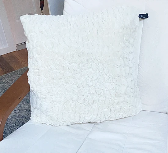 white fuzzy pillow