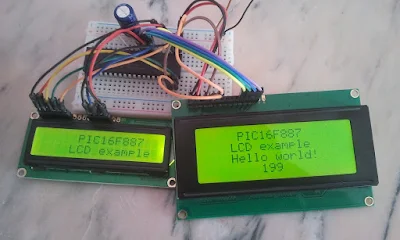 A hardware circuit of PIC16F887 microcontroller with 16x2 and 20x4 LCD displays