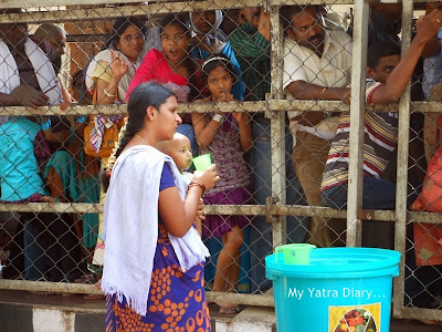 A tired devotee at Tirupati Balaji Temple, Andhra Pradesh