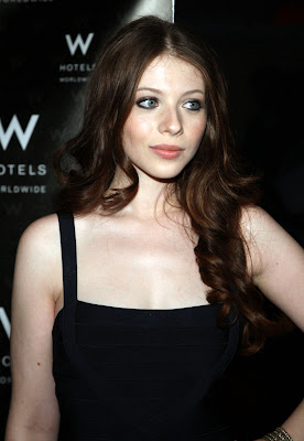 Michelle Trachtenberg in a black dress