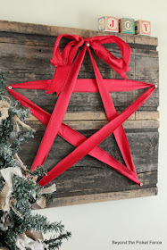 make a christmas star sign in less than an hour with reclaimed wood and ribbon