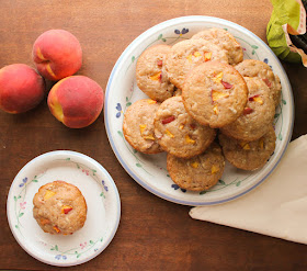 Food Lust People Love: Sweet Peach Cream Cheese Muffins celebrate the best of summer peaches with a wonderfully subtle tang. They are perfect for a summertime brunch, breakfast or snack.
