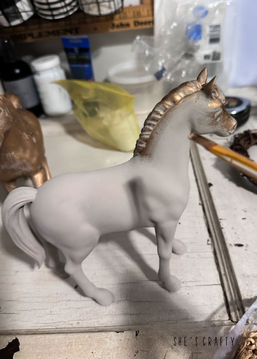 Use rub and buff to give painted horse more dimension.