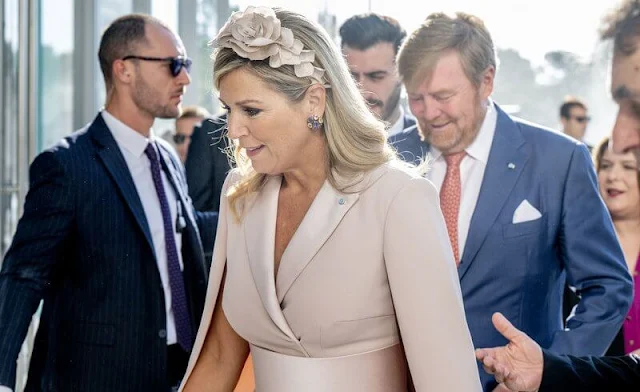 Queen Maxima wore a cape style belted dress by Claes Iversen Spring Summer 2018 couture collection