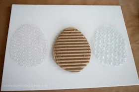 cut out egg stamps from cardboard and bubble wrap