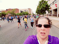 Picture of me running Broad Street Run 2017 as I pass Temple University's campus.