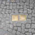 The Deeper Meaning Behind Berlin's Brass Cobblestones