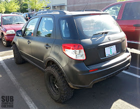 Evil looking Suzuki SX4 from the rear