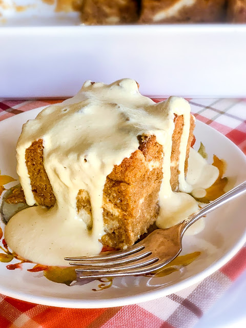 The bread pudding takes on a whole new level of deliciousness using a pumpkin roll cake cut up into cubes, and to add more richness, a pumpkin puree custard is poured over all the cubes.  And served with the Ultimate Custard Sauce, made with a secret ingredient.