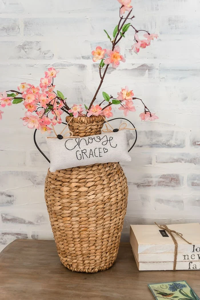 woven vase, Spring blooms, white brick wall
