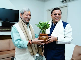 CM Dhami and former CM teerath singh Rawat