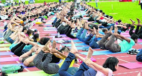 Some 750 people lined up on the track at Home of Athletics in Kallang for a free outdoor yoga session.