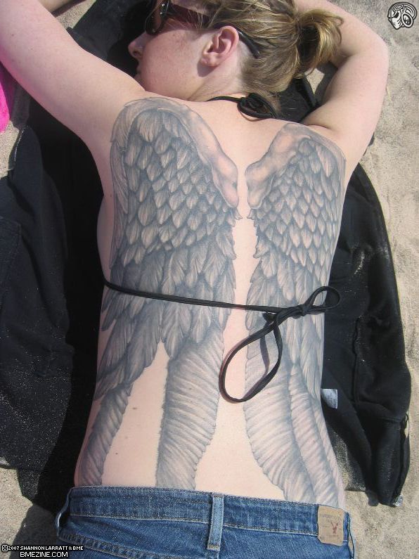 angel wing tattoos on back. cross with wings tattoos.