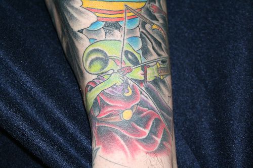 Alien tattoo archer.