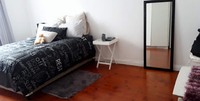 LARGE BEDROOM WITH BUILT-IN-CUPBOARDS AND TILED FLOORS