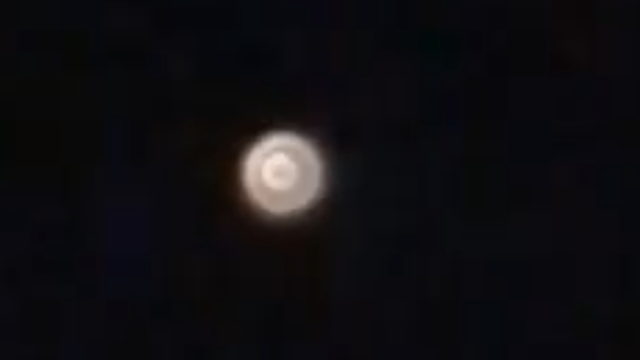 UFO Orb sighting which was filmed over Crosby in Liverpool UK during the night time 17th July 2022.