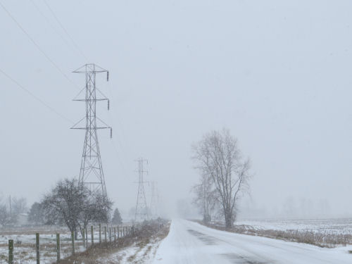 hi tension towers in the snow