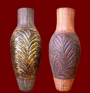 Antique flower vase of decorative wood carvings