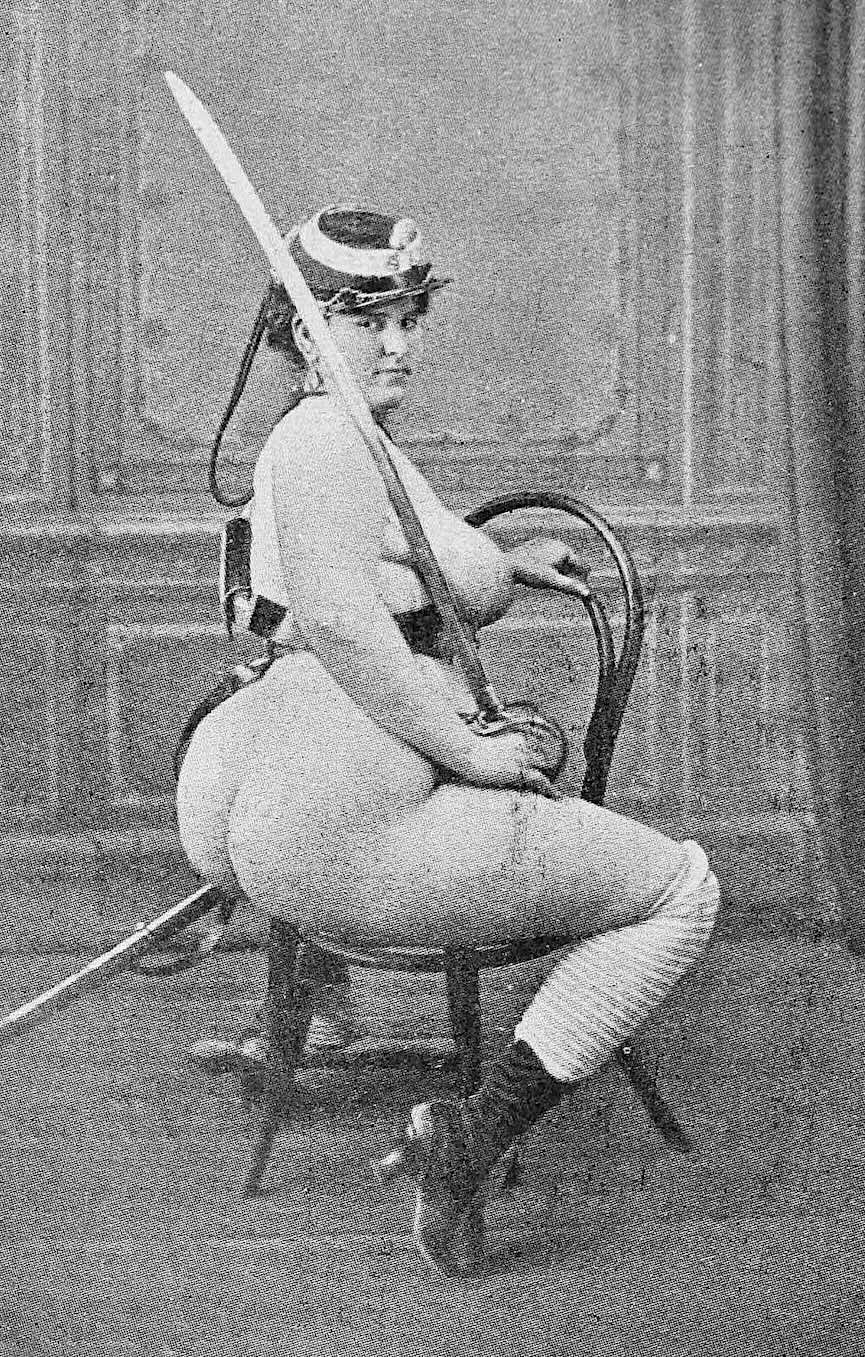 a 1860 erotic postcard, a nude woman in a Union Army hat and sword