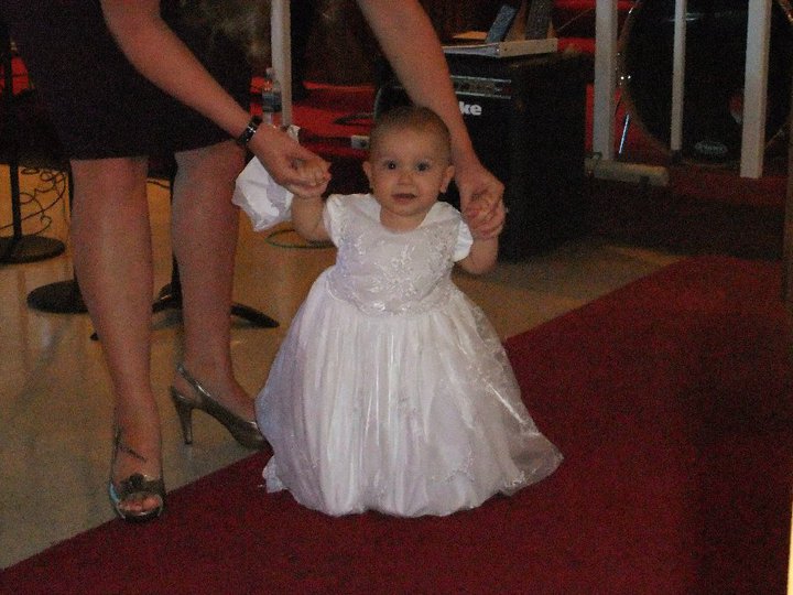 Walking back to her seat in her baby wedding dress lol and my cute shoes 